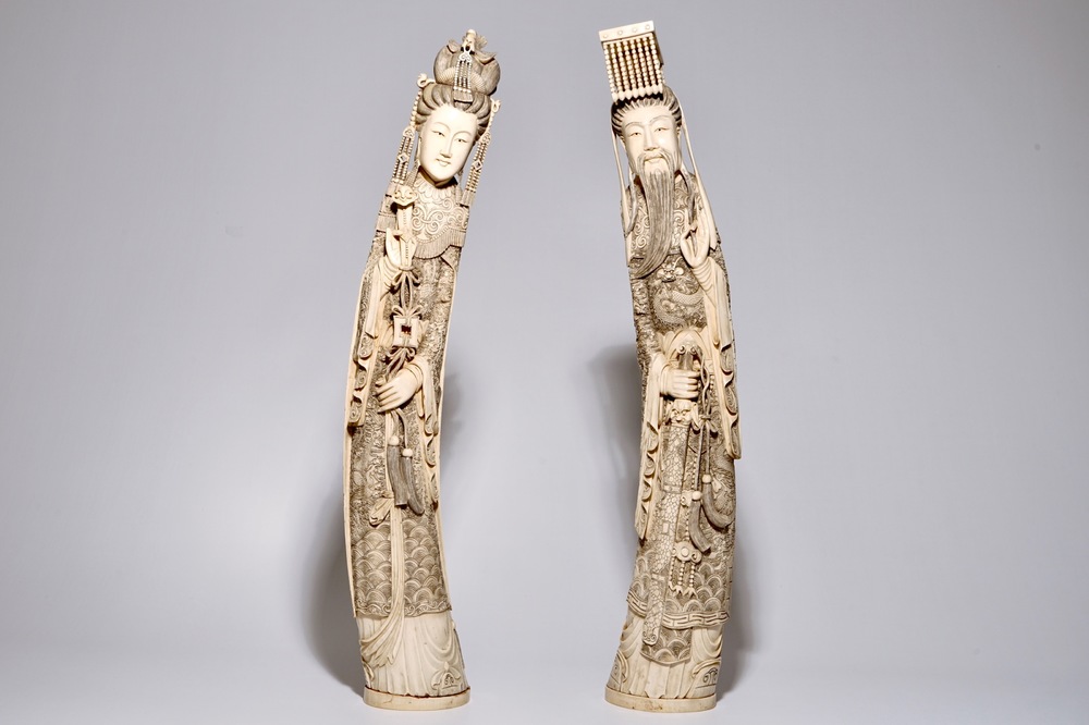 A pair of very large Chinese ivory figures of an emperor and his wife, 19th C.